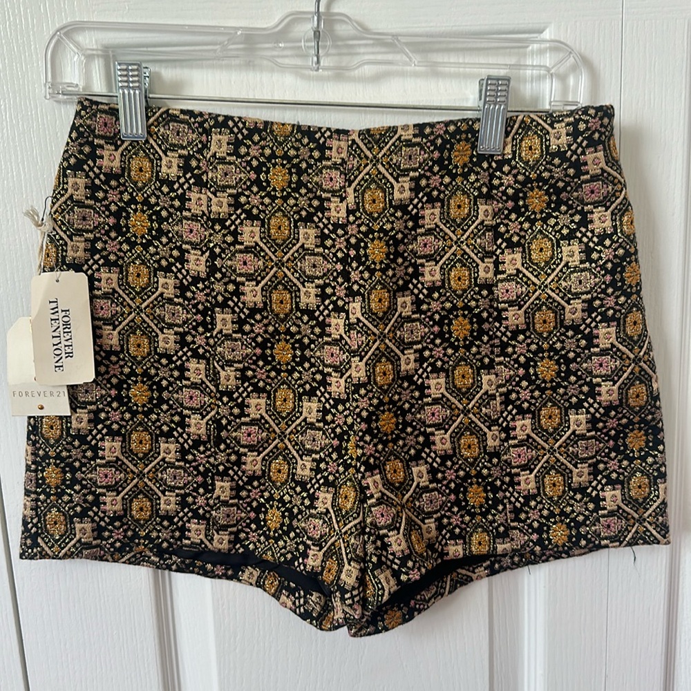 Never worn and NWT Forever 21 black and gold shorts